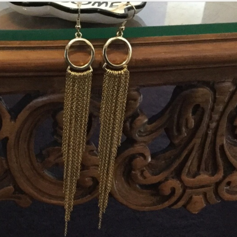 Gold Dangling chain earrings.